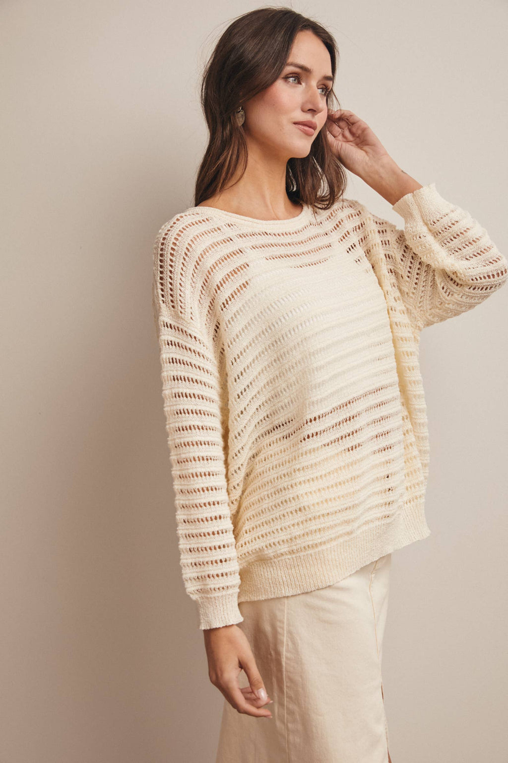 Striped sweater top - side view with open-knit detail