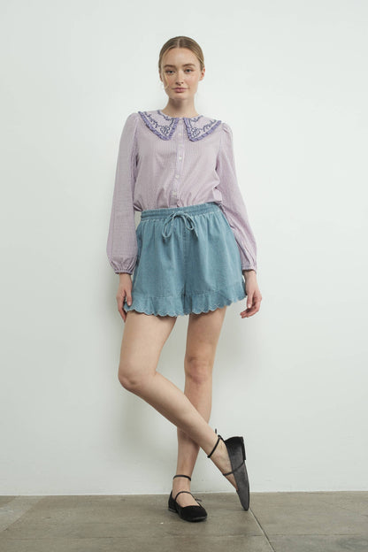 CHAMBRAY EMBROIDERED RUFFLE HEM SHORTS